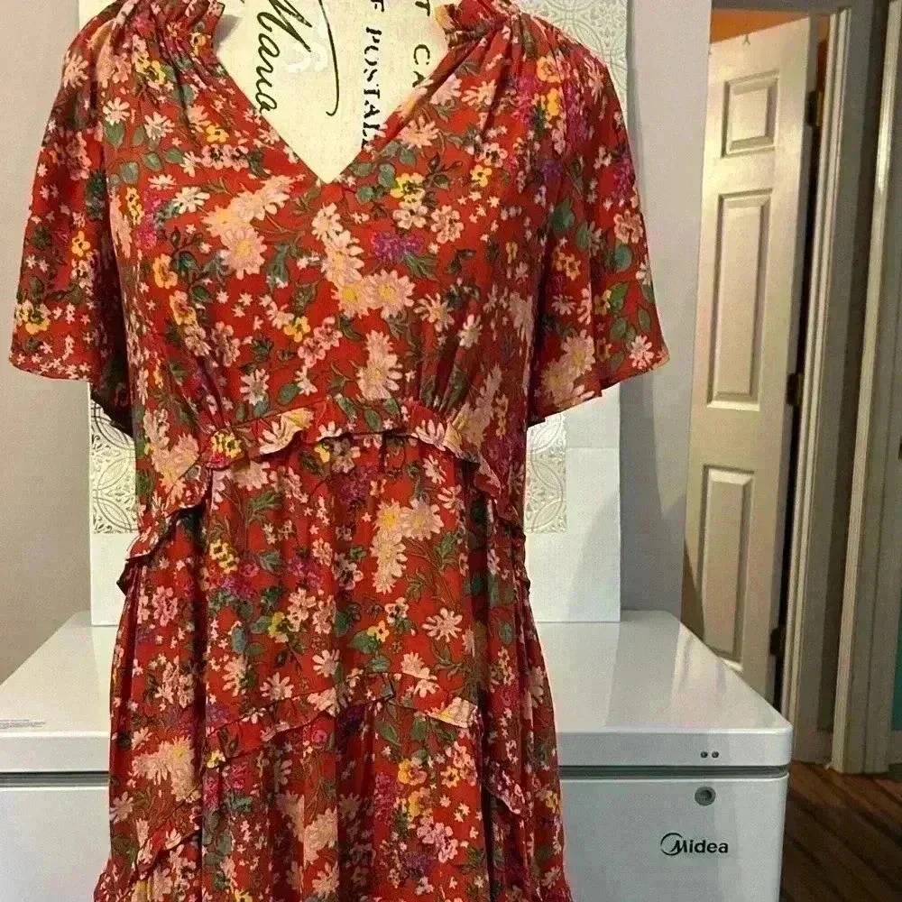 Anthropology dress. Floral. Burnt orange. Size small. Looks new. Short sleeve.